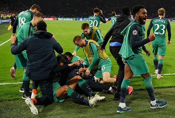 Tottenham players mob Lucas Moura as he completed his hat-trick in the dying embers of stoppage-time