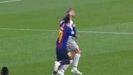 Messi showing the darker side to his game by throwing a punch at Fabinho