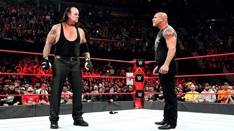 The Undertaker and Goldberg stare down on Raw in January 2017