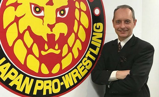Harold Meij next to the New Japan Pro Wrestling logo.
