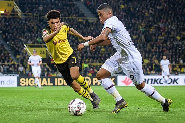 Manchester United have been dealt a blow in their chase for Jadon Sancho(L)
