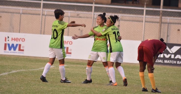 Gokulam Kerala players celebrate after a goal over SSB Women Football Club in the Indian Women&#039;s League