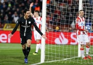 Cavani, pictured here during PSG's win over Red Star Belgrade, has been somewhat of a forgotten man
