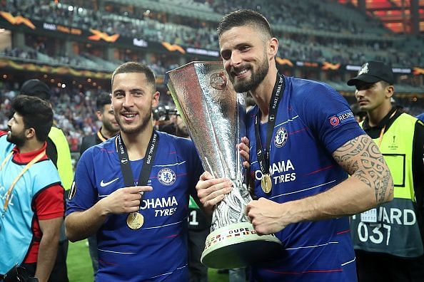 Matchwinners Hazard and Giroud celebrate with the Europa League trophy aloft