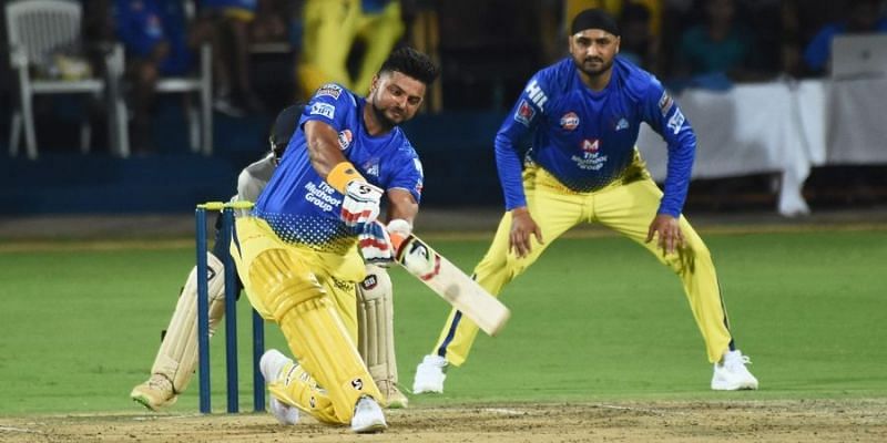 EYES TRANSFIXED ON THE BALL: Harbhajan Singh watches on as Raina lofts the ball over mid on in a practice match for the Chennai Super Kings