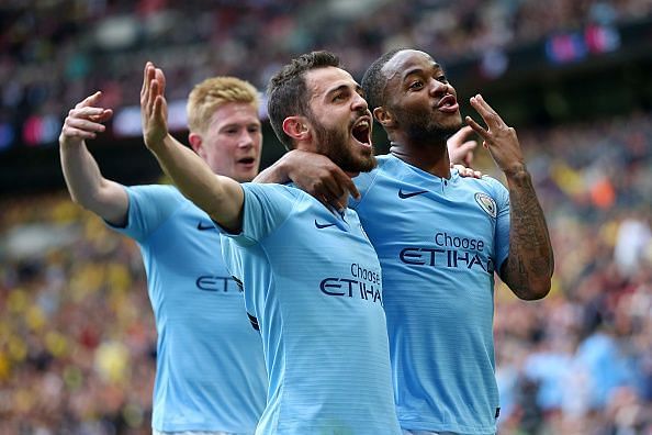 (L-R: de Bruyne, Bernardo Silva and Sterling celebrate as City cruised to a 6-0 win over Watford