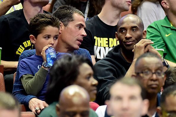 Kobe Bryant and his former agent Rob Pelinka at the NCAA Basketball Tournament - West Regional - Oklahoma v Oregon