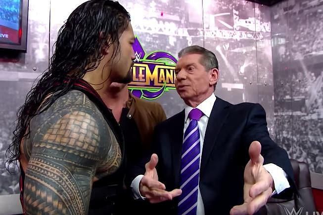 Reigns and Vince backstage