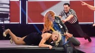 Lacey Evans writhes in Becky Lynch's unforgiving Disarm her finishing move. Will history repeat itself at the MITB PPV, or will Lacey Evans pull off the upset win?