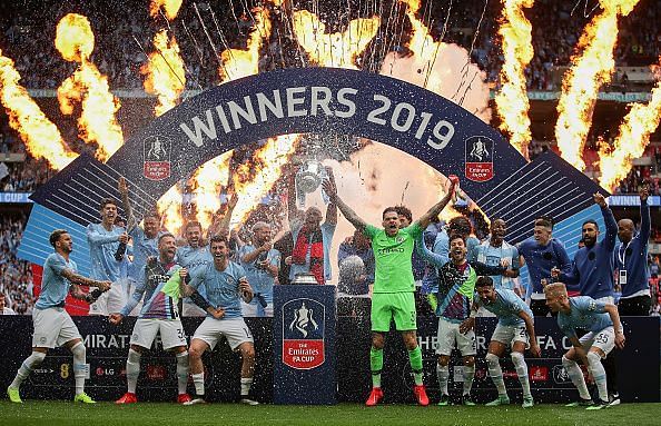 Manchester City players celebrate their FA Cup triumph but will be hoping for more success next year