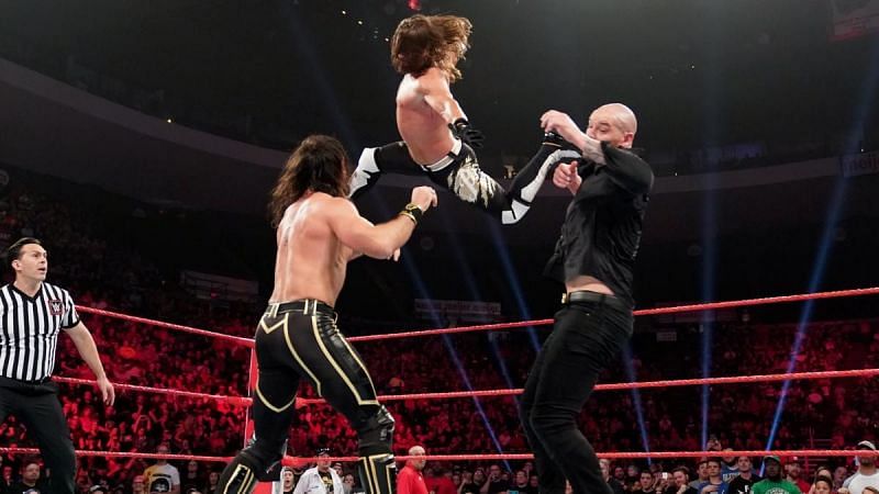Styles left Rollins in the ring after hitting the Phenomenal Forearm
