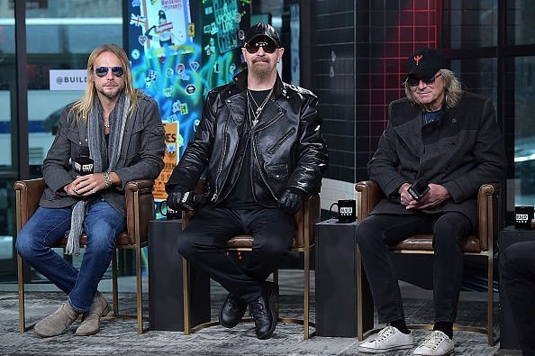 Rob Halford (center) and Judas Priest bandmates visit Build on March 31, 2018