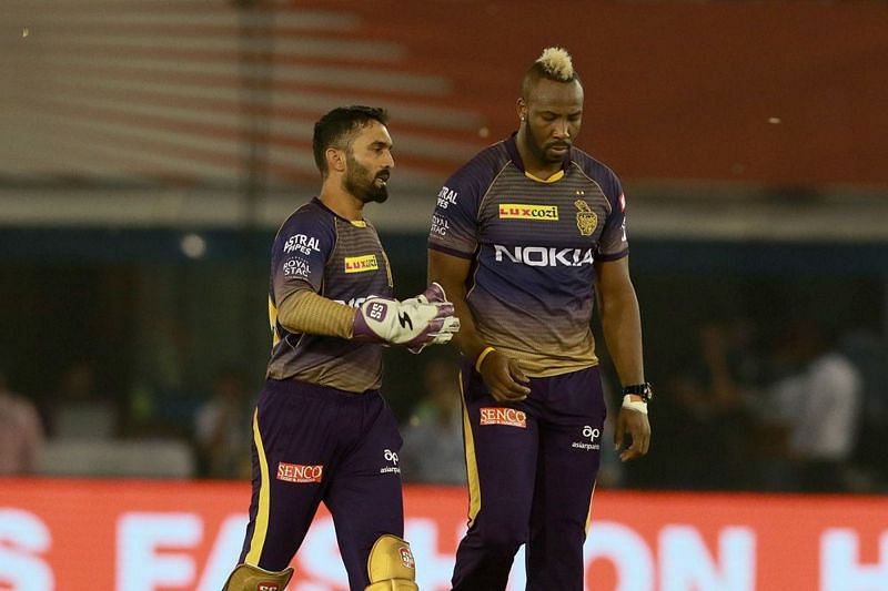 Dinesh Karthik in a conversation with Andre Russel (Image Courtesy: BCCI/iplt20.com)