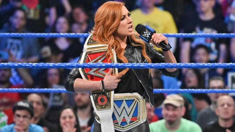 Becky Lynch with her two belts