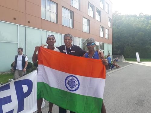 Vikash Malik with teammate Abhinav Jha and team leader Sunil Chainaini at the finish line of IAU 100k world championship