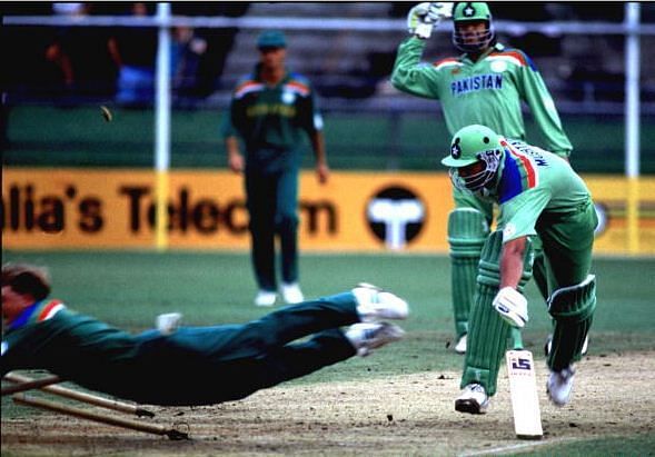 Jonty Rhodes going airborne and into the stumps to run-out Inzamam.
