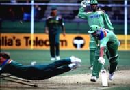 Jonty Rhodes going airborne and into the stumps to run-out Inzamam.