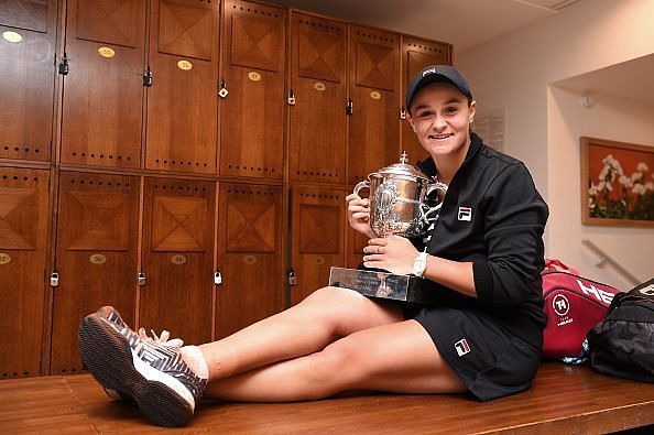 Barty celebrates with her French Open title after a straight-sets victory over Vondrousova