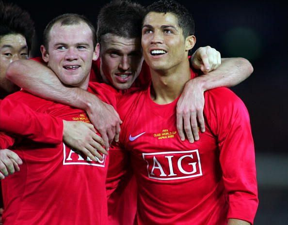 Wayne Rooney alongside Cristiano Ronaldo during their playing days at Manchester United