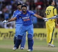 Rohit celebrates