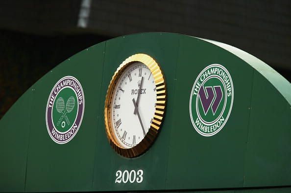 General view of the Rolex clock and Championships logos at Wimbledon