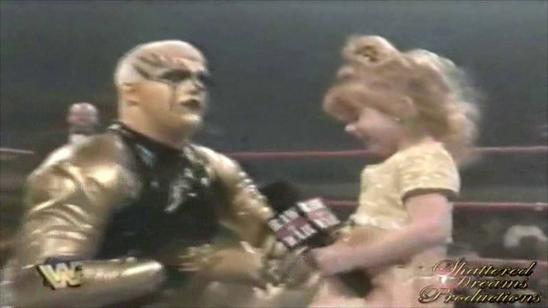 Goldust with his daughter Dakota, during an Attitude Era edition of RAW.