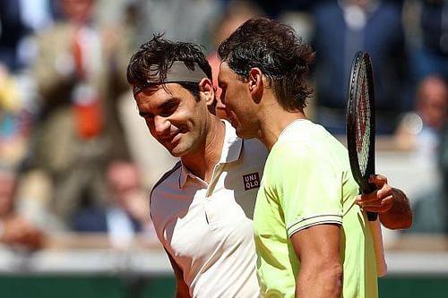 Federer and Nadal embrace each other after the match