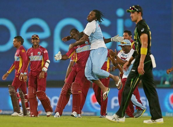 Mitchell Starc looks on as the West Indians celebrate