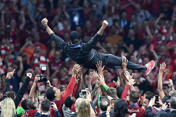 Klopp goes airborne as Liverpool players and staff join in