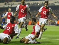 Ashley Cole celebrates scoring the winning goal