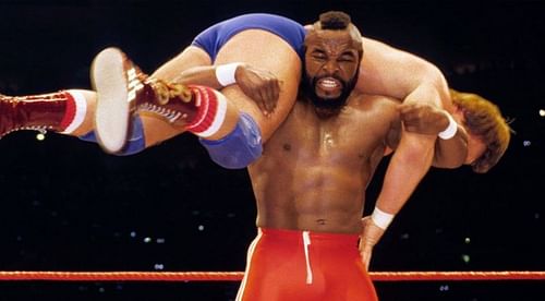 Mr. T hoists Roddy Piper on his shoulders at Wrestlemania.
