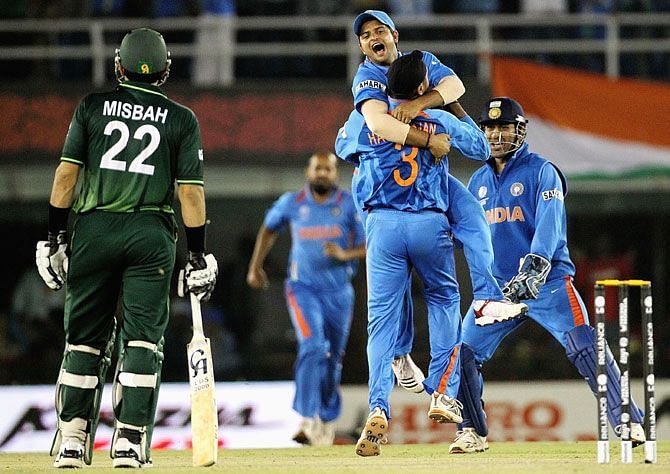 Indians celebrate the wicket of Umar Akmal