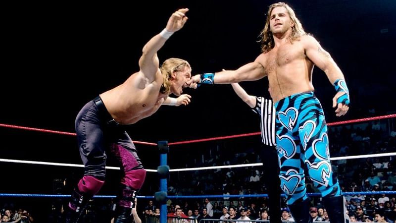 Shawn Michaels gooses the nose of Triple H.