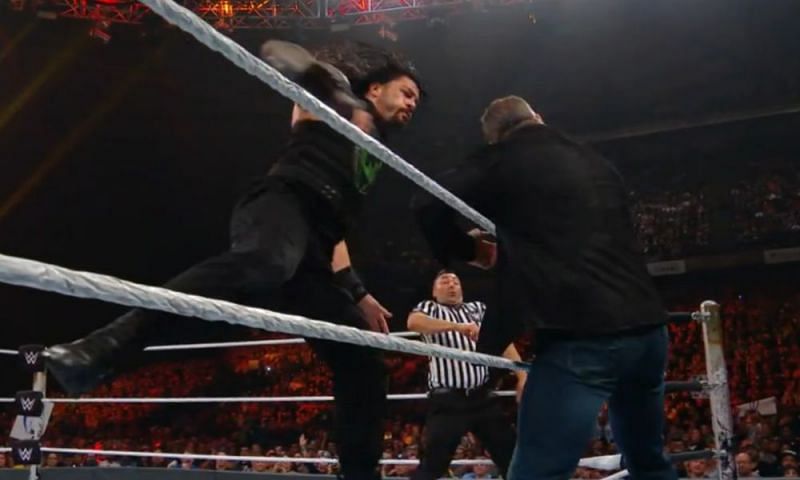 Shane McMahon got involved in the match but was taken out by Roman Reigns.