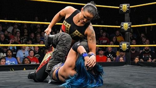Caption- Shayna Baszler vs Mia Yim
