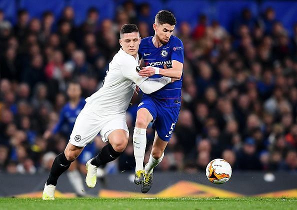 Luka Jovic tussles for the ball with Chelsea&#039;s Jorginho