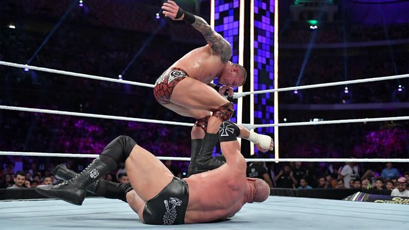Orton and Triple H in action