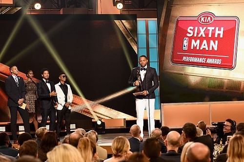 Eric Gordon (pictured, centre) during the 2017 NBA Awards with his accolade for Sixth Man of the Year