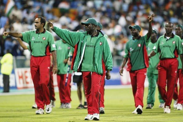 Steve Tikolo, captain of Kenya leads his players on a lap of honour