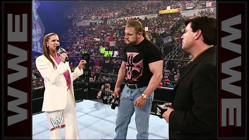 In-ring negotiation with Triple H at Vengeance 2002.