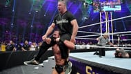 Drew McIntyre celebrating with Shane McMahon
