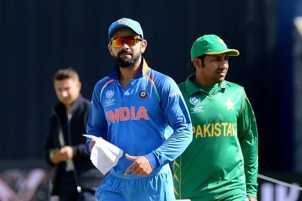 Virat Kohli and Sarfaraz Ahmed