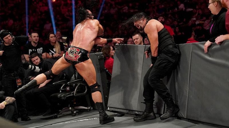Roman Reigns and Drew McIntyre brawling outside the ring. Will the squared circle be big enough to contain these two WWE Superstars?