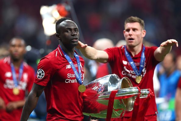 Sadio Mane with the UEFA Champions League trophy