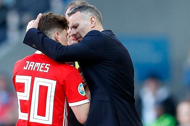 Daniel James alongside Wales manager and United legend Ryan Giggs