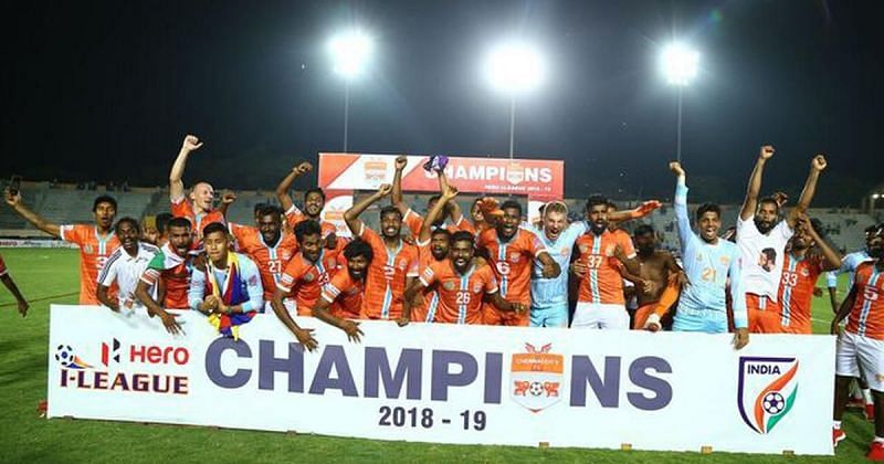 Chennai City FC players celebrate after winning the I-League