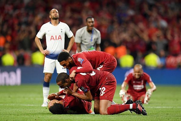 van Dijk, Matip and Gomez celebrate at the full-time whistle after Liverpool&#039;s Champions League Final win