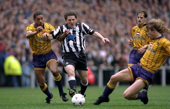 Peter Beardsley of Newcastle United and Des Walker of Sheffield Wednesday