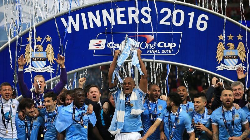 Vincent Company lifts the League Cup after Man City&#039;s victory over Klopp&#039;s Liverpool