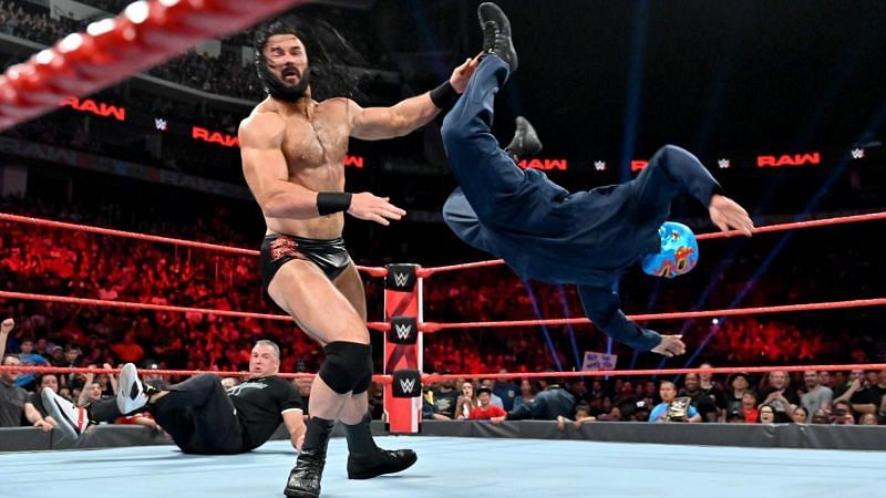 The mysterious Garbutt and Roman Reigns were able to topple Shane McMahon and Drew McIntyre